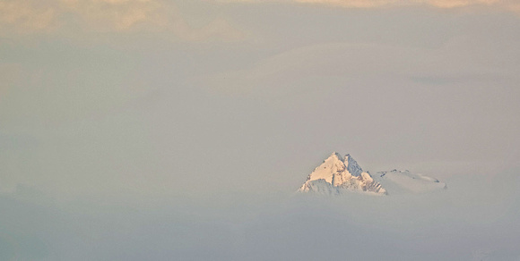 Mountain in the clouds Berg in den Wolken Grisons Graubünden, by Ueli Rehsteiner